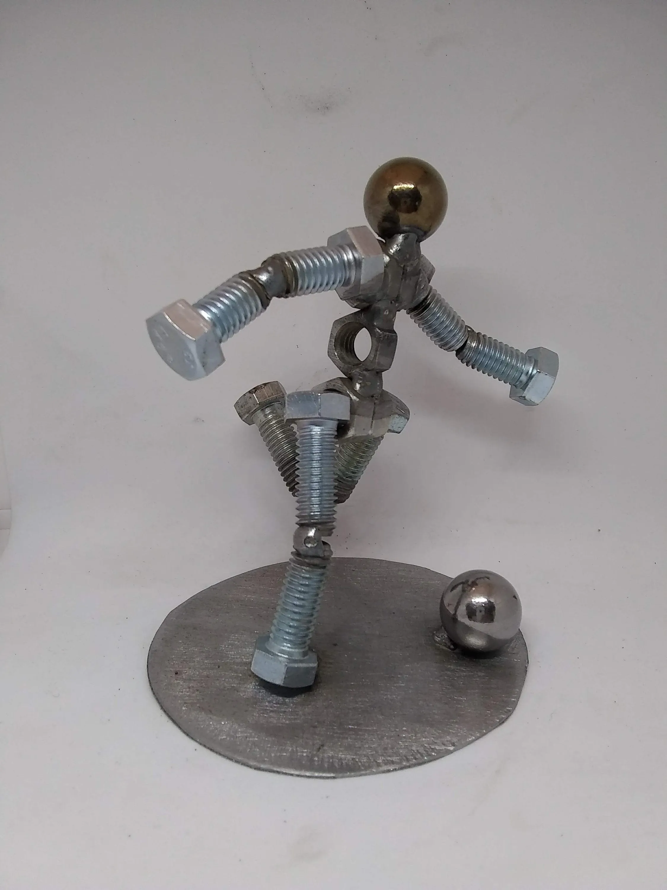 Soccer Player Metal Bolt Figurine, Kick shot athlete, Upcycled Metal Art