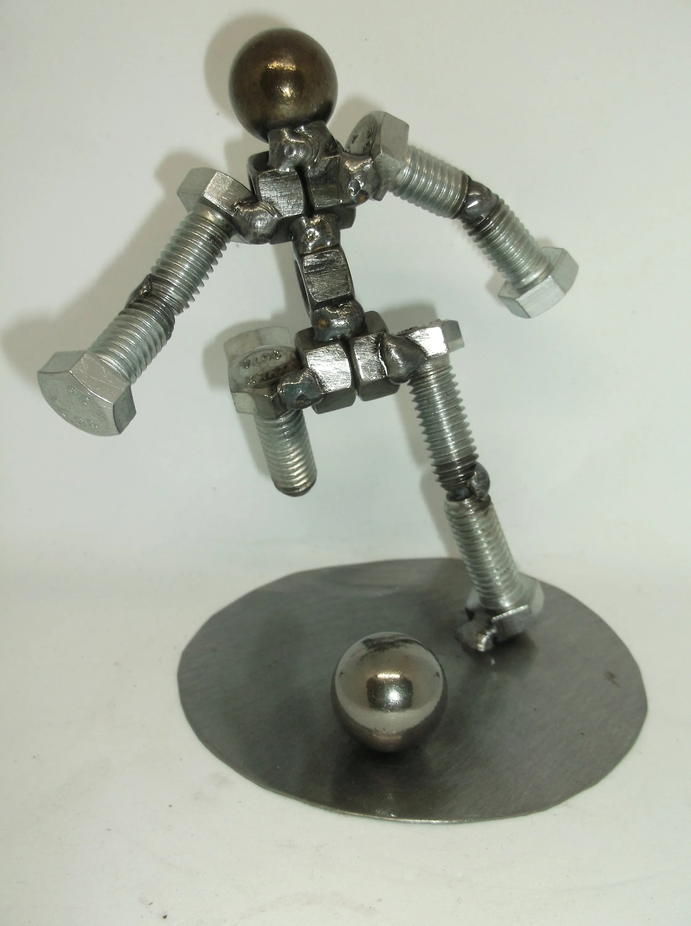 Soccer Player Metal Bolt Figurine, Kick shot athlete, Upcycled Metal Art